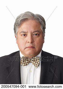 Stock Photography - man wearing suit 
with bow tie, 
on white background, 
portrait. fotosearch 
- search stock 
photos, pictures, 
images, and photo 
clipart