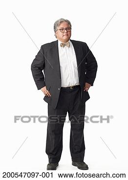 Stock Photography - man wearing suit 
with bow tie, 
on white background, 
portrait. fotosearch 
- search stock 
photos, pictures, 
images, and photo 
clipart