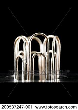 Stock Photography - paper clips sticking 
out of holder. 
fotosearch - search 
stock photos, 
pictures, images, 
and photo clipart