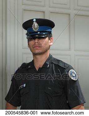Stock Photography - policeman standing 
in street, portrait. 
fotosearch - search 
stock photos, 
pictures, images, 
and photo clipart