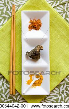 Stock Photography - saffron, mushroom 
and curry powder 
on serving tray, 
overhead view. 
fotosearch - search 
stock photos, 
pictures, images, 
and photo clipart
