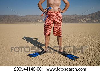 Stock Photography - snorkeller in 
desert, low section. 
fotosearch - search 
stock photos, 
pictures, images, 
and photo clipart