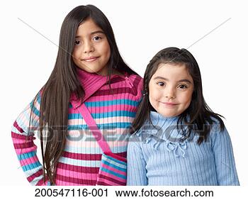 Stock Photography - two sisters (5-9) 
with black hair, 
on white background, 
portrait. fotosearch 
- search stock 
photos, pictures, 
images, and photo 
clipart