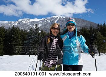 Stock Photography - two women cross-country 
skiing, portrait. 
fotosearch - search 
stock photos, 
pictures, images, 
and photo clipart