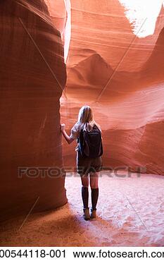 Stock Photography - usa, arizona, 
antelope canyon, 
woman inside canyon, 
rear view. fotosearch 
- search stock 
photos, pictures, 
images, and photo 
clipart