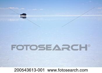 Stock Photography - vehicle driving 
on salt flat. 
fotosearch - search 
stock photos, 
pictures, images, 
and photo clipart