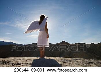 Stock Photography - woman wearing 
angel wings standing 
on rocks, full 
length. fotosearch 
- search stock 
photos, pictures, 
images, and photo 
clipart