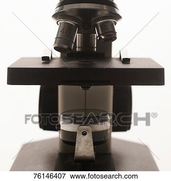Picture - microscope against 
white background, 
front view, close-up. 
fotosearch - search 
stock photos, 
pictures, images, 
and photo clipart