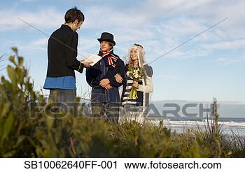 Stock Photography - teenage boy (14-15), 
 teenage girl 
(16-17) and young 
man performing. 
fotosearch - search 
stock photos, 
pictures, images, 
and photo clipart