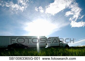Stock Photography - truck and car 
crossing field, 
side view. fotosearch 
- search stock 
photos, pictures, 
images, and photo 
clipart