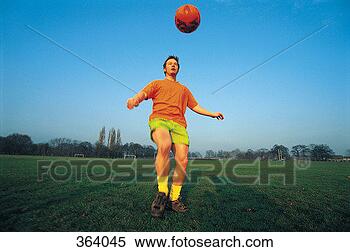 Stock Image - balance, ball 
game, caucasian, 
daylight. fotosearch 
- search stock 
photos, pictures, 
images, and photo 
clipart