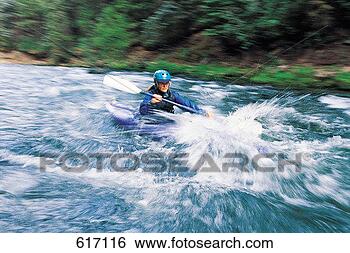 Stock Photo - canoe, canoeing, 
canoeist, caucasian, 
daylight. fotosearch 
- search stock 
photos, pictures, 
images, and photo 
clipart