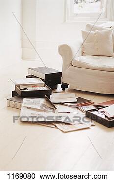 Stock Photography - folders, newspapers 
and documents 
on a wooden living 
room floor. fotosearch 
- search stock 
photos, pictures, 
images, and photo 
clipart