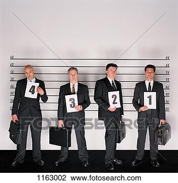 Stock Photo - group of serious 
businessmen standing 
holding briefcases 
and placards. 
fotosearch - search 
stock photos, 
pictures, images, 
and photo clipart