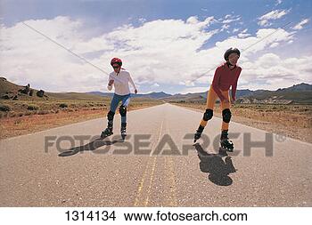 Stock Photo - two young women 
inline skating 
on a country road. 
fotosearch - search 
stock photos, 
pictures, images, 
and photo clipart