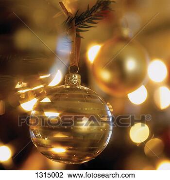 Stock Photo - close up of baubles 
on a christmas 
tree. fotosearch 
- search stock 
photos, pictures, 
images, and photo 
clipart