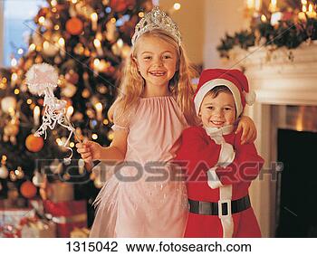 Stock Photo - portrait of a 
girl dressed in 
a fairy costume 
standing beside 
her. fotosearch 
- search stock 
photos, pictures, 
images, and photo 
clipart