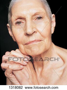 Stock Photo - portrait of a 
senior woman with 
her hands together. 
fotosearch - search 
stock photos, 
pictures, images, 
and photo clipart