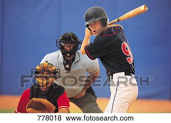 Stock Photo - baseball batter 
in front of baseball 
catcher and umpire. 
fotosearch - search 
stock photos, 
pictures, images, 
and photo clipart