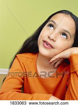 Stock Photo - portrait of a 
young girl daydreaming. 
fotosearch - search 
stock photos, 
pictures, images, 
and photo clipart