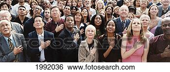 Stock Photo - large crowd of 
people pledging 
allegiance. fotosearch 
- search stock 
photos, pictures, 
images, and photo 
clipart