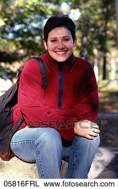 Stock Photo - girl sitting outside 
with backpack 
copyrightjohn 
foxx images and. 
fotosearch - search 
stock photos, 
pictures, images, 
and photo clipart