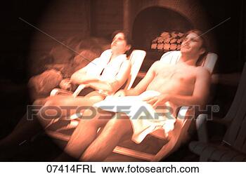 Stock Photo - couple relaxing 
in lounge chairs. 
fotosearch - search 
stock photos, 
pictures, images, 
and photo clipart