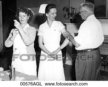 Stock Photo - doctor giving 
nurse a shot. 
fotosearch - search 
stock photos, 
pictures, images, 
and photo clipart