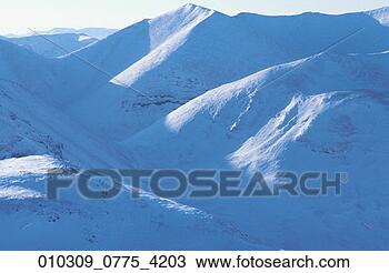 Stock Photo - white snow-covered 
mountains. fotosearch 
- search stock 
photos, pictures, 
images, and photo 
clipart