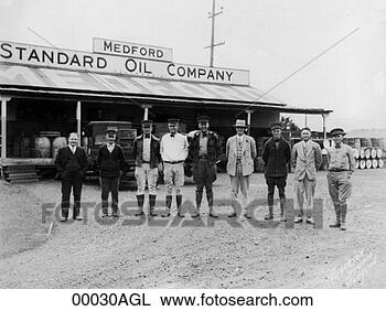 Stock Photo - men standing in 
front of medford 
standard oil company. 
fotosearch - search 
stock photos, 
pictures, images, 
and photo clipart