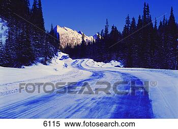 Stock Image - mountain road 
in winter. fotosearch 
- search stock 
photos, pictures, 
images, and photo 
clipart