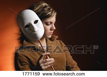 Stock Photograph - caucasian woman 
with white mask. 
fotosearch - search 
stock photos, 
pictures, images, 
and photo clipart