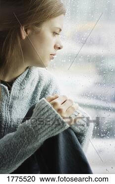 Stock Photography - watching the rain. 
fotosearch - search 
stock photos, 
pictures, images, 
and photo clipart