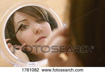 Stock Photo - applying makeup. 
fotosearch - search 
stock photos, 
pictures, images, 
and photo clipart