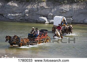 Stock Photo - horse and wagon 
through water. 
fotosearch - search 
stock photos, 
pictures, images, 
and photo clipart