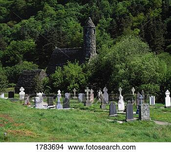 Stock Photo - gravestones and 
ruin of st kevin's 
church, glendalough 
monastery. fotosearch 
- search stock 
photos, pictures, 
images, and photo 
clipart