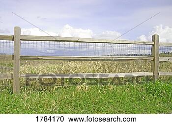 Stock Photography - post and rail 
fence along a 
meadow. fotosearch 
- search stock 
photos, pictures, 
images, and photo 
clipart