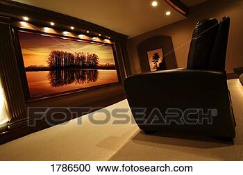 Stock Photography - chair and photograph 
in living room. 
fotosearch - search 
stock photos, 
pictures, images, 
and photo clipart