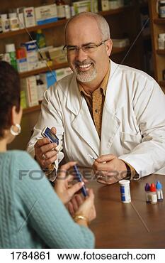 Stock Photography - pharmacist with 
patient. fotosearch 
- search stock 
photos, pictures, 
images, and photo 
clipart