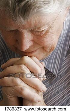 Picture - senior woman praying. 
fotosearch - search 
stock photos, 
pictures, images, 
and photo clipart