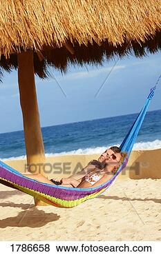 Stock Photo - couple in hammock. 
fotosearch - search 
stock photos, 
pictures, images, 
and photo clipart