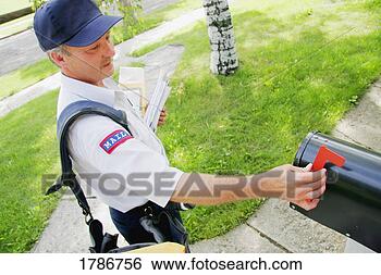 Stock Photo - mail carrier at 
work. fotosearch 
- search stock 
photos, pictures, 
images, and photo 
clipart