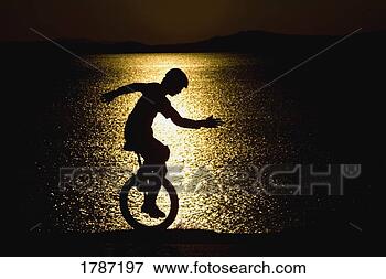 Picture - silhouette of 
unicycle. fotosearch 
- search stock 
photos, pictures, 
images, and photo 
clipart