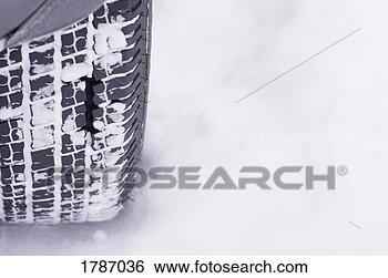 Stock Photo - snowy tire. fotosearch 
- search stock 
photos, pictures, 
images, and photo 
clipart