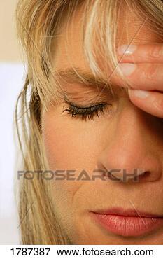 Picture - a woman with her 
hand on her head. 
fotosearch - search 
stock photos, 
pictures, images, 
and photo clipart