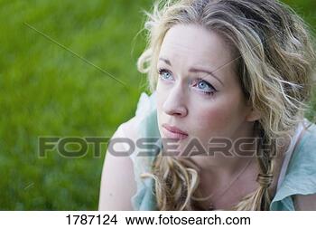 Stock Photo - woman with tear. 
fotosearch - search 
stock photos, 
pictures, images, 
and photo clipart