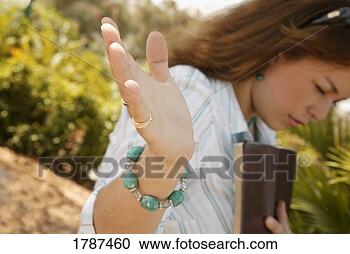 Stock Photography - worshipping woman. 
fotosearch - search 
stock photos, 
pictures, images, 
and photo clipart