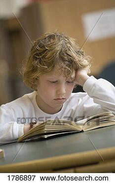 Picture - young boy reading. 
fotosearch - search 
stock photos, 
pictures, images, 
and photo clipart