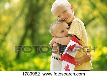 Stock Photo - boys with canadian 
flags. fotosearch 
- search stock 
photos, pictures, 
images, and photo 
clipart