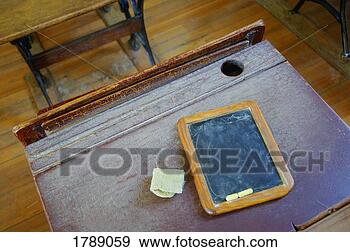 Stock Photograph - desk and chalkboard. 
fotosearch - search 
stock photos, 
pictures, images, 
and photo clipart